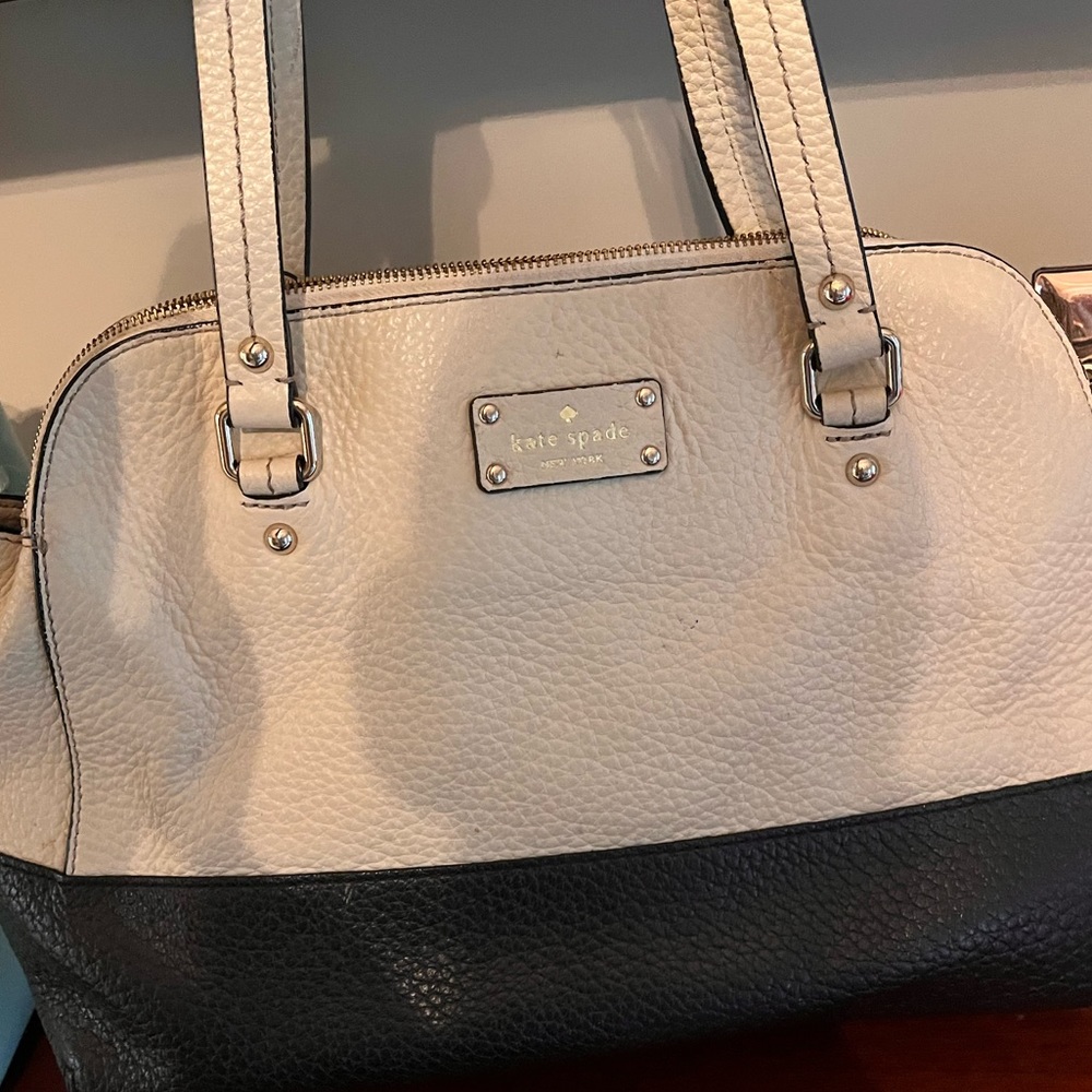 Kate Spade shoulder black and cream bag. Used condition but still good.